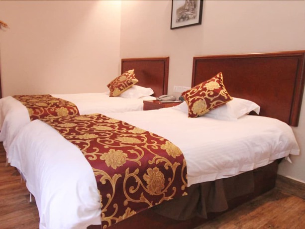 Imagen de la habitación del Hotel Greentree Inn Huangshan Tangkou Town Scenic Spot South Gate Transfer Center. Foto 14