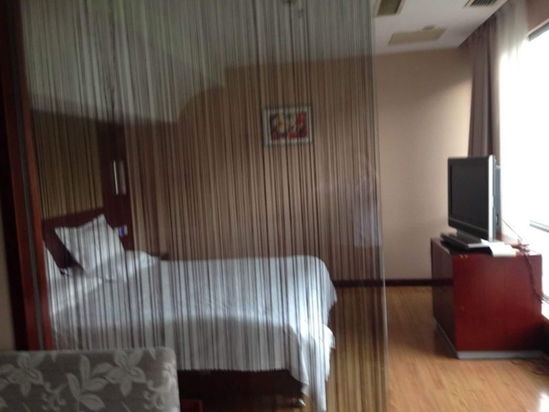 Imagen de la habitación del Hotel Greentree Inn Jiangsu Suzhou Heshan Business. Foto 8