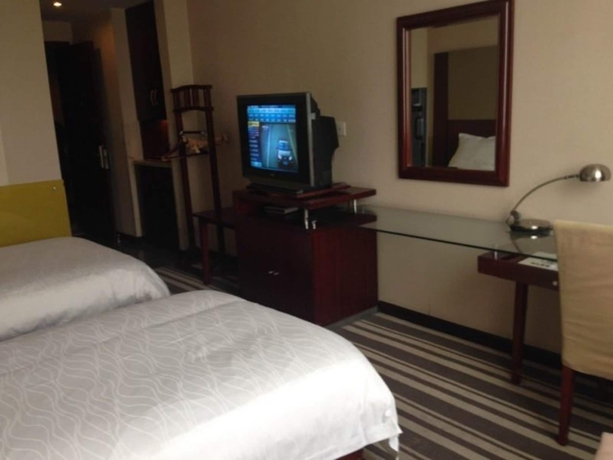 Imagen de la habitación del Hotel Greentree Inn Jiangsu Suzhou Heshan Business. Foto 10