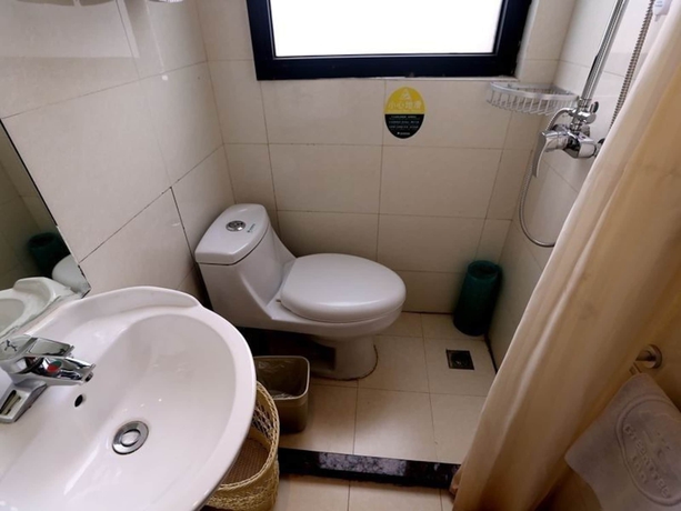 Imagen de la habitación del Hotel Greentree Inn Jiangsu Suzhou Zhonghuan Baihui Square Middle Yangchenghu Station Express. Foto 7