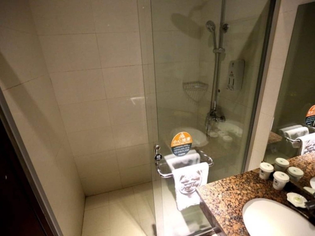 Imagen de la habitación del Hotel Greentree Inn Jiangsu Suzhou Zhonghuan Baihui Square Middle Yangchenghu Station Express. Foto 18