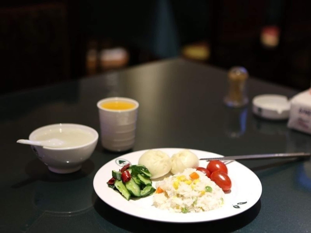 Imagen del bar/restaurante del Hotel Greentree Inn Jiangsu Suzhou Zhonghuan Baihui Square Middle Yangchenghu Station Express. Foto 6