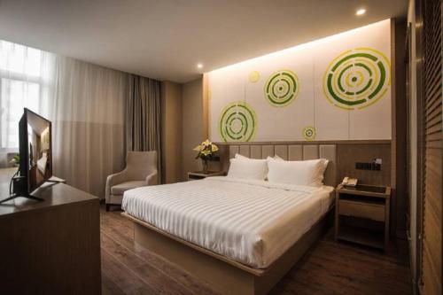 Imagen de la habitación del Hotel Greentree Inn Jiangsu Taizhou Dongfeng Road Expres. Foto 7