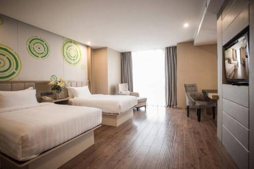 Imagen de la habitación del Hotel Greentree Inn Jiangsu Taizhou Dongfeng Road Expres. Foto 8