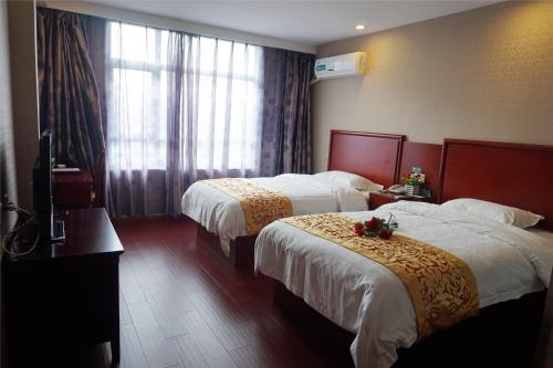 Imagen de la habitación del Hotel Greentree Inn Jiangsu Yangzhou Shou West Lake Busi. Foto 4