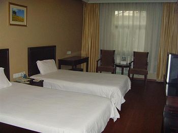 Imagen de la habitación del Hotel Greentree Inn Jinan Beiyuan Yinzuo. Foto 9