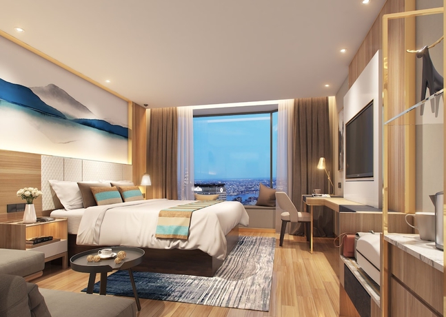 Imagen de la habitación del Hotel Greentree Inn Kaifeng Jinming Plaza Business. Foto 12