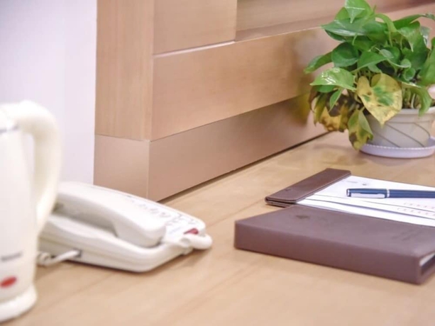 Imagen de la habitación del Hotel Greentree Inn Kaifeng Jinming Plaza Business. Foto 16