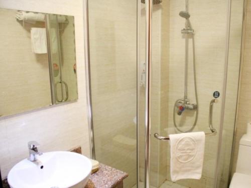 Imagen de la habitación del Hotel Greentree Inn Newtown Malu Subway Station Business. Foto 8