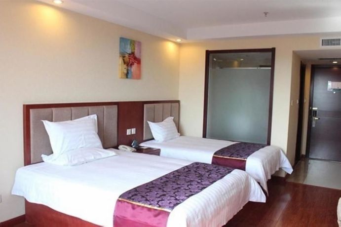 Imagen de la habitación del Hotel Greentree Inn Qingdao Wuyishan Road Jusco Shopping Mall. Foto 3