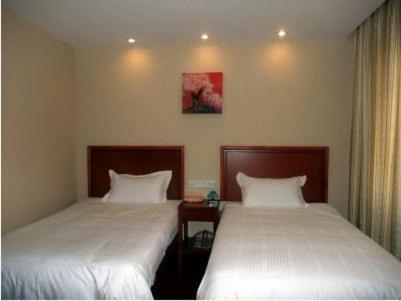 Imagen de la habitación del Hotel Greentree Inn Rizhao Bus Terminal Station Business. Foto 3