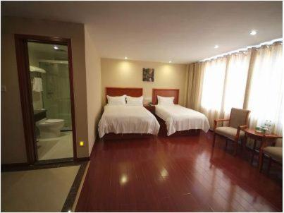 Imagen de la habitación del Hotel Greentree Inn Rizhao Bus Terminal Station Business. Foto 4