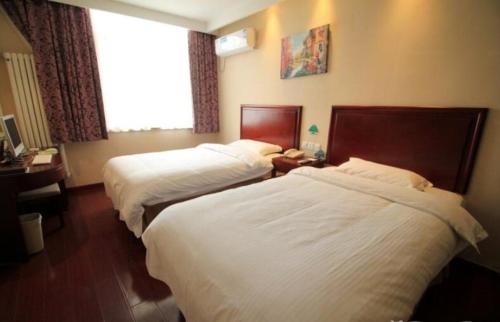 Imagen de la habitación del Hotel Greentree Inn Shandong Yantai Penglai Pavilion Bei. Foto 10