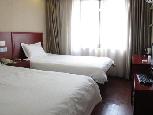 Imagen de la habitación del Hotel Greentree Inn Shanghai Baoshan Yanghang Shuichan R. Foto 4