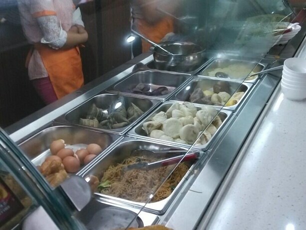 Imagen del bar/restaurante del Hotel Greentree Inn Shanghai Changxing Island Yuansha Bu. Foto 4