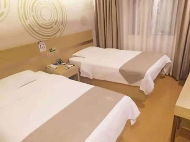 Imagen de la habitación del Hotel Greentree Inn Shanghai Minxing Beiqiao Station Express. Foto 9