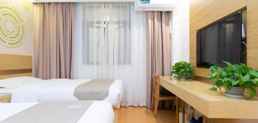 Imagen de la habitación del Hotel Greentree Inn Shanghai Minxing Beiqiao Station Express. Foto 11