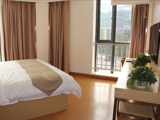 Imagen de la habitación del Hotel Greentree Inn Shanghai Minxing Beiqiao Station Express. Foto 12