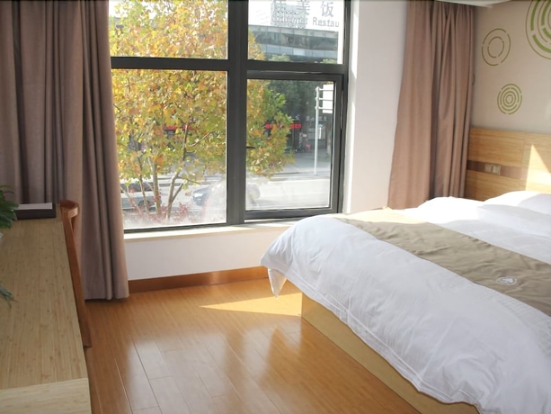 Imagen de la habitación del Hotel Greentree Inn Shanghai Minxing Beiqiao Station Express. Foto 13