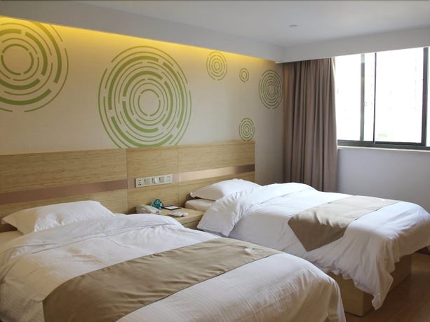 Imagen de la habitación del Hotel Greentree Inn Shanghai Minxing Beiqiao Station Express. Foto 14