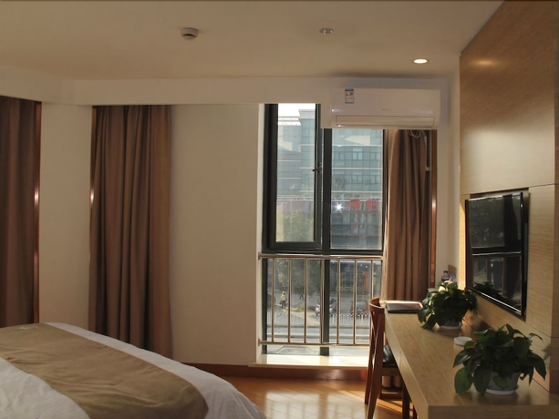 Imagen de la habitación del Hotel Greentree Inn Shanghai Minxing Beiqiao Station Express. Foto 15