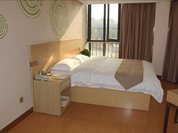 Imagen de la habitación del Hotel Greentree Inn Shanghai Minxing Beiqiao Station Express. Foto 16