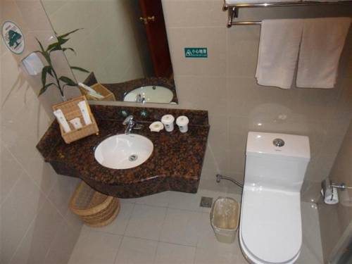 Imagen de la habitación del Hotel Greentree Inn Shanghai Zhujing Business. Foto 5