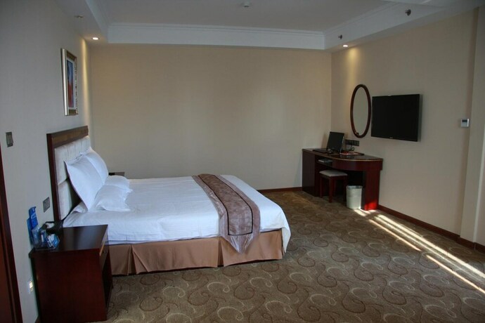 Imagen de la habitación del Hotel Greentree Inn Shantou Chengjiang Road Business. Foto 15