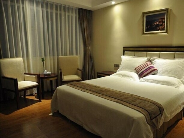 Imagen de la habitación del Hotel Greentree Inn Shantou Chengjiang Road Business. Foto 18