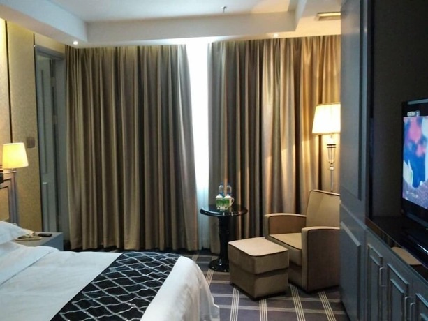 Imagen de la habitación del Hotel Greentree Inn Shantou Chengjiang Road Business. Foto 21