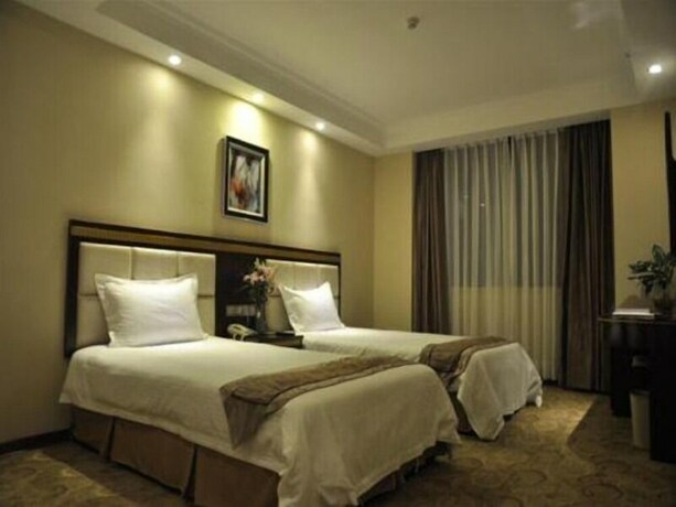 Imagen de la habitación del Hotel Greentree Inn Shantou Chengjiang Road Business. Foto 23
