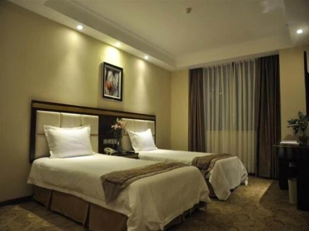 Imagen de la habitación del Hotel Greentree Inn Shantou Chengjiang Road Business. Foto 27