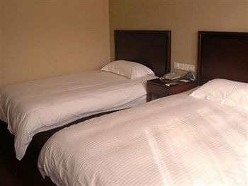 Imagen de la habitación del Hotel Greentree Inn Su Zhou Yangyuxiang. Foto 2