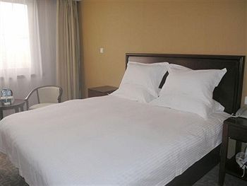 Imagen de la habitación del Hotel Greentree Inn Su Zhou Yangyuxiang. Foto 5