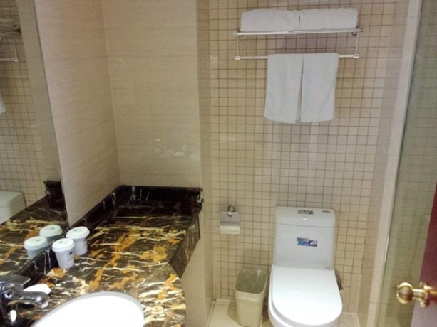 Imagen de la habitación del Hotel Greentree Inn Suzhou Kunshan High Speed Rail Station Hengshan Road Express. Foto 4