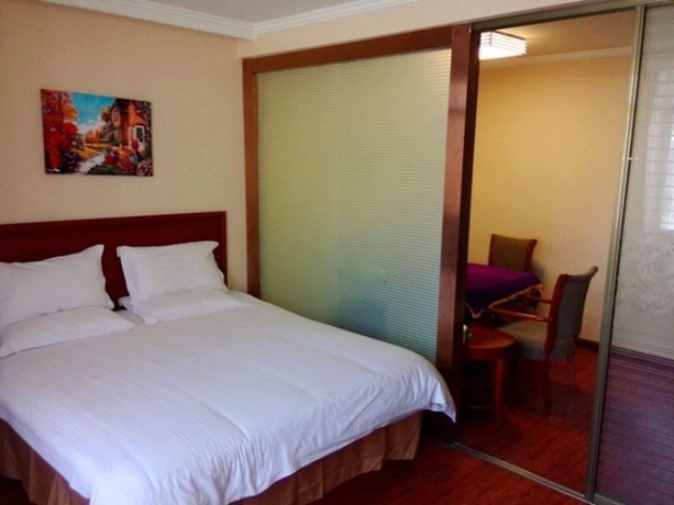 Imagen de la habitación del Hotel Greentree Inn Suzhou Kunshan High Speed Rail Station Hengshan Road Express. Foto 17