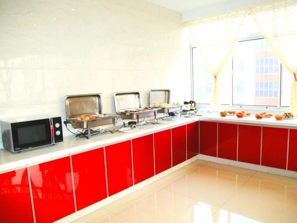 Imagen del bar/restaurante del Hotel Greentree Inn Suzhou Zhangjiagang Daxin Town Pingbei Road Express. Foto 3