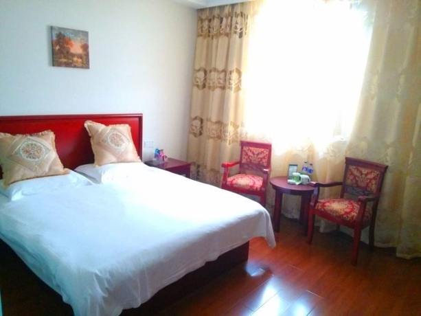 Imagen de la habitación del Hotel Greentree Inn Suzhou Zhangjiagang Daxin Town Pingbei Road Express. Foto 7