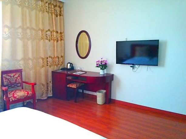 Imagen de la habitación del Hotel Greentree Inn Suzhou Zhangjiagang Daxin Town Pingbei Road Express. Foto 9