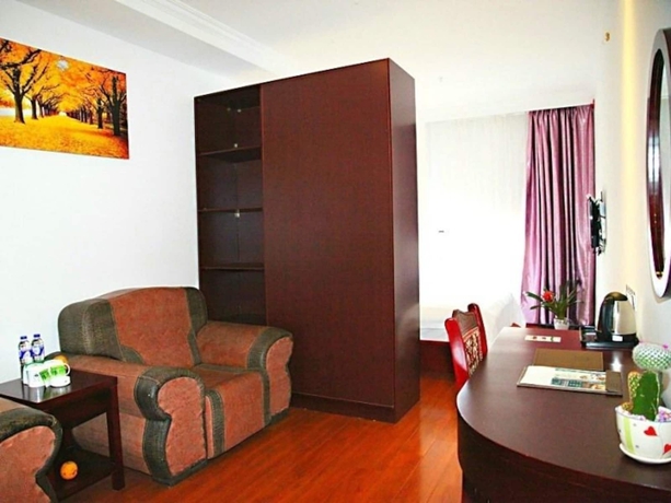 Imagen de los interiores del Hotel Greentree Inn Suzhou Zhangjiagang Daxin Town Pingbei Road Express. Foto 17
