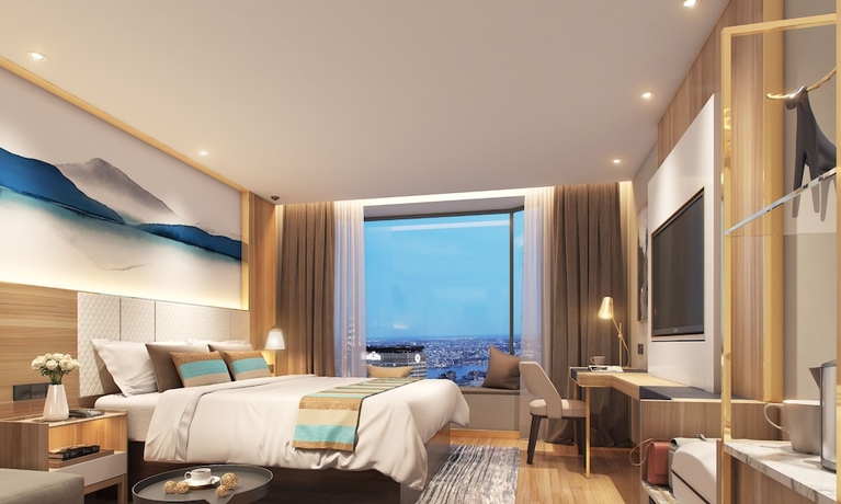 Imagen de la habitación del Hotel Greentree Inn Suzhou Zhangjiagang Yangshe Old Street Stadium Express. Foto 6
