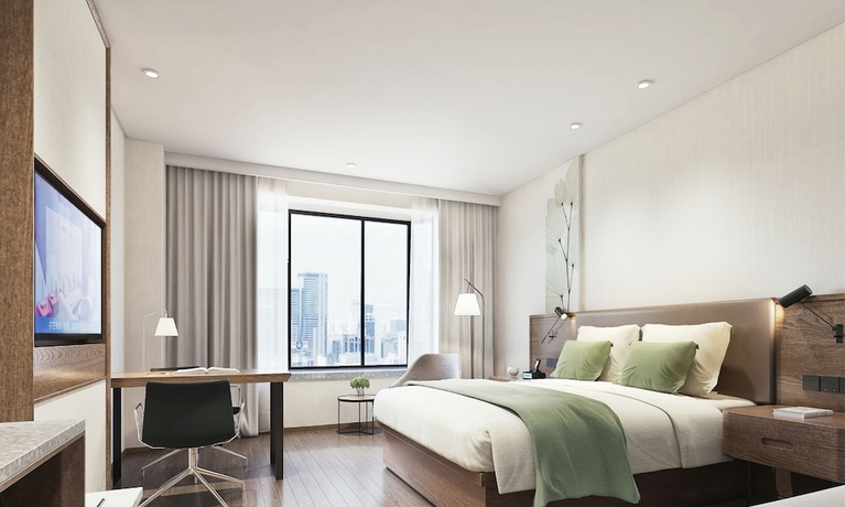 Imagen de la habitación del Hotel Greentree Inn Suzhou Zhangjiagang Yangshe Old Street Stadium Express. Foto 7