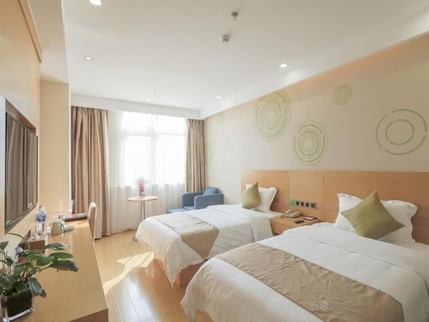 Imagen de la habitación del Hotel Greentree Inn Suzhou Zhangjiagang Yangshe Old Street Stadium Express. Foto 8
