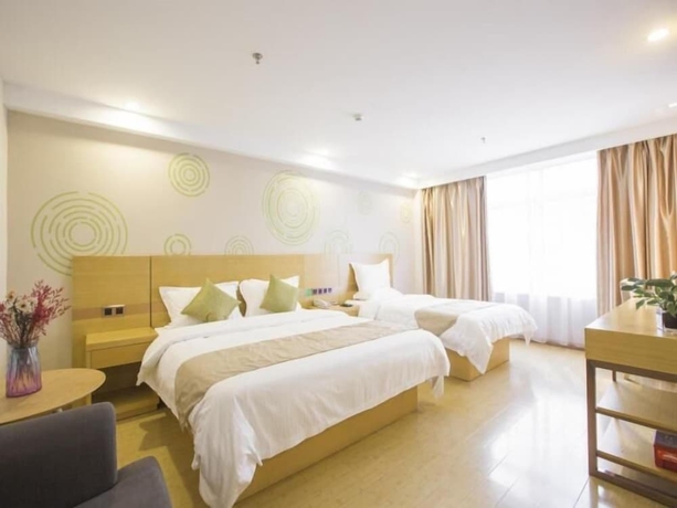 Imagen de la habitación del Hotel Greentree Inn Suzhou Zhangjiagang Yangshe Old Street Stadium Express. Foto 13