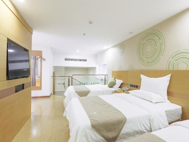Imagen de la habitación del Hotel Greentree Inn Suzhou Zhangjiagang Yangshe Old Street Stadium Express. Foto 14