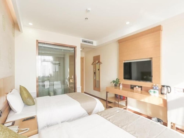 Imagen de la habitación del Hotel Greentree Inn Suzhou Zhangjiagang Yangshe Old Street Stadium Express. Foto 15