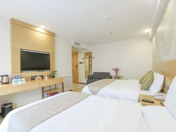 Imagen de la habitación del Hotel Greentree Inn Suzhou Zhangjiagang Yangshe Old Street Stadium Express. Foto 17