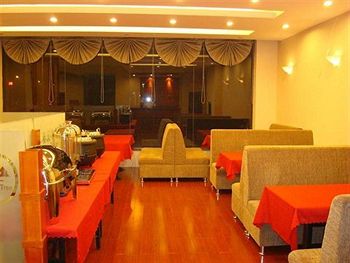Imagen del bar/restaurante del Hotel Greentree Inn Taizhou East Meilan Road University Town. Foto 2