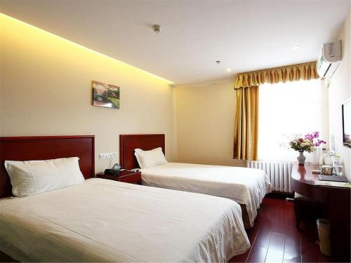 Imagen de la habitación del Hotel Greentree Inn Tianjin Meijiang Convention and Exhibition Center Express. Foto 5
