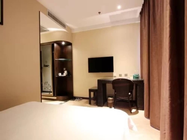 Imagen de la habitación del Hotel Greentree Inn Weihai International Beach. Foto 3